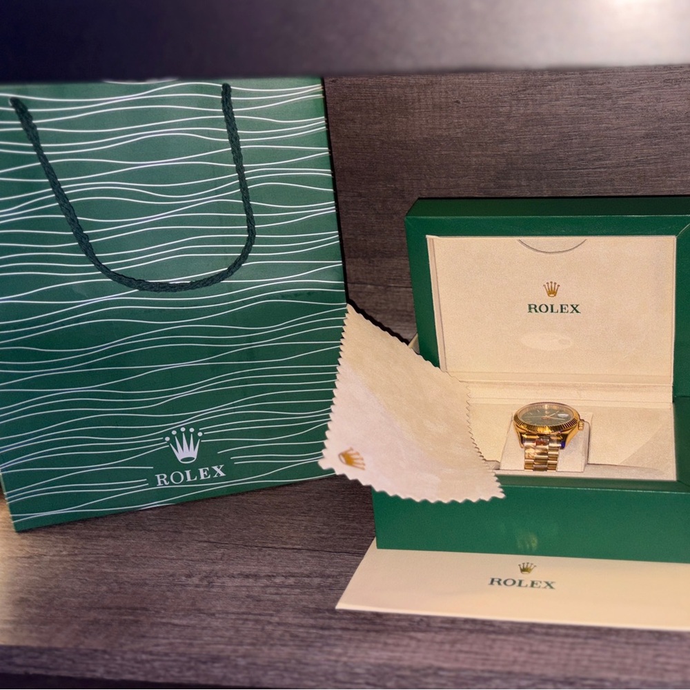 Rolex day date gold